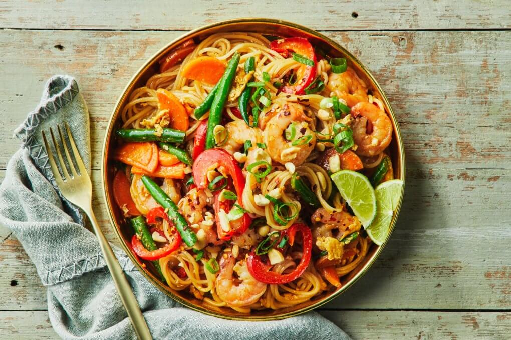 Prawn and Rice Noodle Stir-Fry with Vegetables, Peanuts and Lime