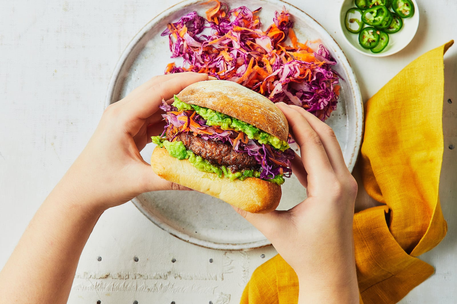 Vegan Tex-Mex and Guacamole Burger with Red Cabbage Slaw